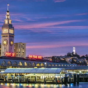 Night view of Embarcadero waterfront with Ferry Building, San Francisco, California, USA