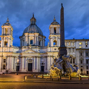 Night view of Piazza Navona with Church of Sant Agnese in Agone and Fountain