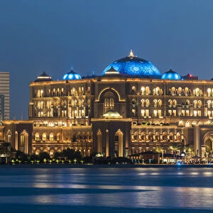Night view from the sea over the Emirates Palace hotel, Abu Dhabi, United Arab Emirates
