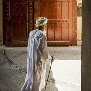 Nizwa, Sultanate of Oman, Middle East. Old man with tradition dress