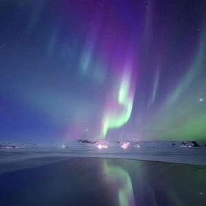 Northern lights over Dyrholaey lagoon during winter, Sudurland, Iceland
