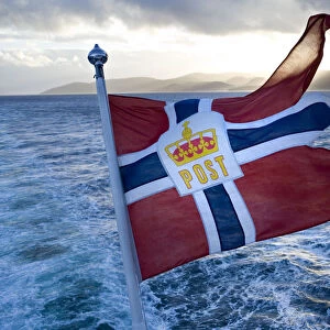 Norwegian flag, on the Hurtigruten coastal express, Northern Norway
