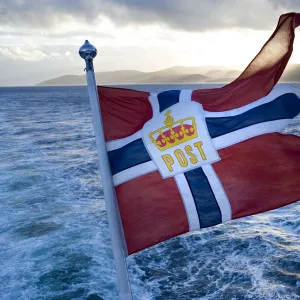 Norwegian flag, on the Hurtigruten coastal express, Northern Norway