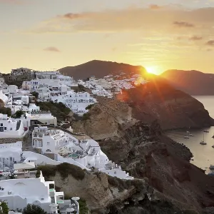 Oia and Finikia at sunrise, Santorini, Cyclades Islands, Greece, Europe