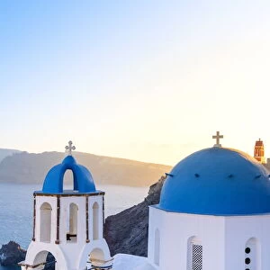 Oia, Santorini, Cyclades, Greece The famous blue domes of the churches of Oia
