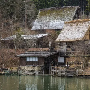 Old farmhouses under a snowfall at Hida Minzoku Mura Folk Village, Takayama, Gifu