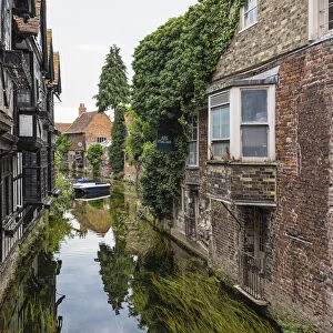 Old houses reflected in the Great Stour river in Canterbury, Kent, England