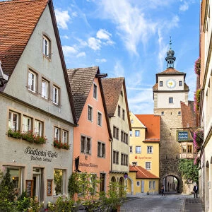 Old town cobblestone street with timber framed houses, Rothenburg ob der Tauber, Bavaria