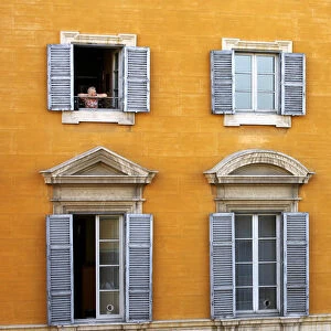 Old Woman looking out of Window, Rome, Italy