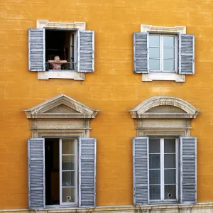 Old Woman looking out of Window, Rome, Italy