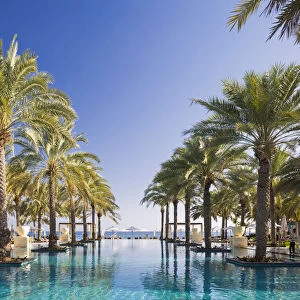 Oman. Muscat Governorate, Muscat. The 50 metre infinity pool at the Ritz Carlton Al