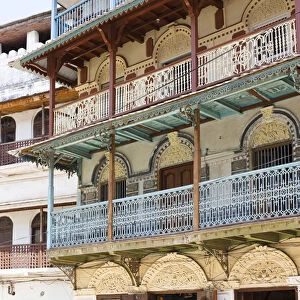 Ornate balconies on restored buildings in old Stone Town, Zanzibar, Tanzania