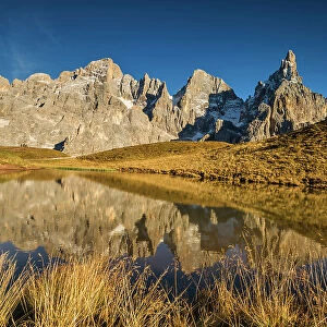 Pale di San Martino Reflecting in Alpine Lake, Passo Rolle, Dolomites, Trentino-Alto Adige, Italy