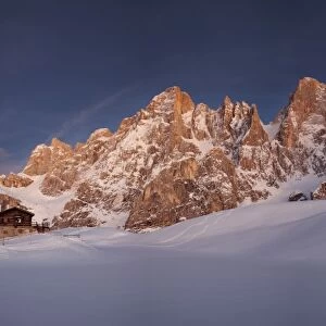 Pale di San Martino in winter with full moon seen from the Segantini hut, Trentino Alto Adige