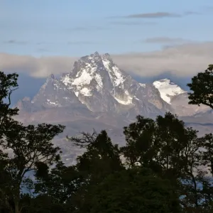 The peaks of Mount Kenya from the Aberdare National Park. Mount Kenya is Africas second highest mountain rising to a height of