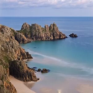 Pednvounder Beach and Logan Rock from the clifftops near Treen, Porthcurno, Cornwall, England
