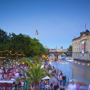 People dancing by the Spree River, Berlin, Germany