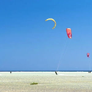 People enjoying kitesurfing at Sotavento beach (Playa de Sotavento de Jandia)