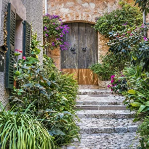 Picturesque cobbled street in the mountain village of Fornalutx, Majorca, Balearic