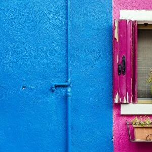 Picturesque colourful detail of a painted house in Burano, Veneto, Italy