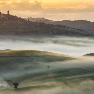 Pienza on a misty morning in the Val D Orcia, Tuscany Italy