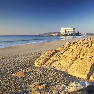 Plettenberg Bay beach at dawn with Beacon Island Hotel in background, Western Cape
