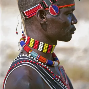 A Pokot man wearing typical beaded ornaments of his tribe. The Pokot are pastoralists speaking a Southern Nilotic