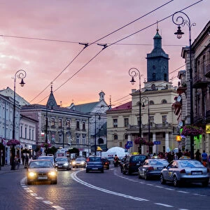 Poland, Lublin Voivodeship, City of Lublin, Krolewska Street and City Hall at sunset