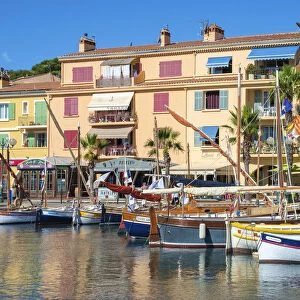 Port harbor filled with traditional wooden fishing boats at Sanary-sur-Mer, Var department