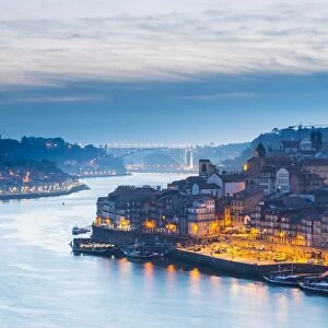Portugal, Douro Litoral, Porto. Dusk in the UNESCO listed Ribeira district of Porto