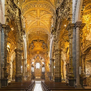Portugal, Douro Litoral, Porto. The stunning Baroque gilt wood carvings of Igreja