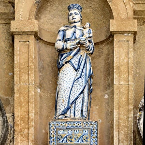 Portugal, Estramadura, Obidos, Statue at Almshouse church