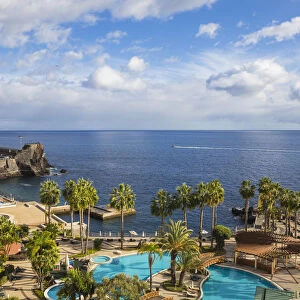 Portugal, Madeira, Funchal, View of Royal Savoy Hotel swimming pool