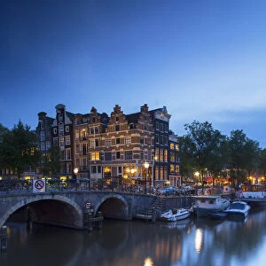 Prinsengracht and Brouwersgracht canals at dusk, Amsterdam, Netherlands