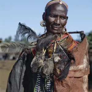 A proud Samburu mother of two recently circumcised