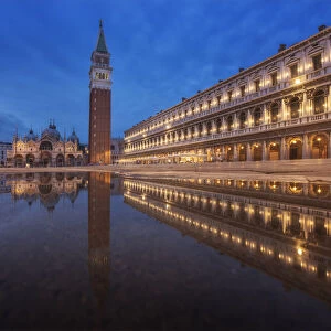 rain puddle reflectio at St. Mark Square, Venice, Italy