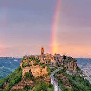 Rainbow over Civita di Bagnoregio at sunset, Bagnoregio, Lazio, Italy, Europe