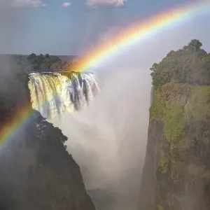 Rainbow over Victoria Falls, Victoria Falls, Zimbabwe Rainbow over Victoria Falls, Victoria Falls, Zimbabwe
