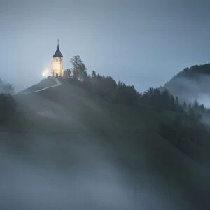 Rainy twilight over the Jamnik church in spring, Slovenia