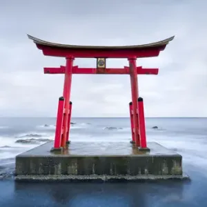 Red torii gate near Shosambetsu, Hokkaido, Japan Red torii gate near Shosambetsu, Hokkaido, Japan