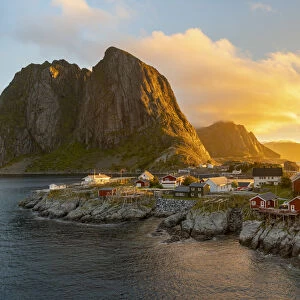 Red wooden huts, known as Rorbu, in the village of Reine on the Hamnoy island, Lofoten