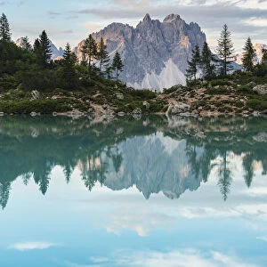 Reflection of Cadini di Misurina on Sorapis Lake in summer. Cortina d Ampezzo