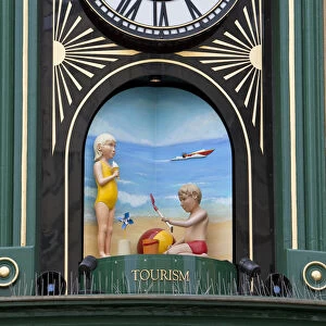 Revolving tableaux on the clock over Rivoli jewellers, St Helier, Jersey, Channel
