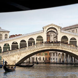 The Rialto Bridge is one of the four bridges spanning the Grand Canal in Venice