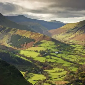 Rich autumn sunlight illuminates Newlands Valley in the Lake District, Cumbria, England Rich autumn sunlight illuminates Newlands Valley in the Lake District, Cumbria, England