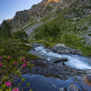 River and mountains at Arpy lake at sunset during summer, Morgex, Valle D‚AoAosta, Italy