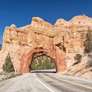 Road through Rock Archway, near Bryce Canyon National Park, Utah, USA