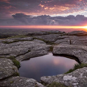 Rock Basin on Kestor at sunrise, Dartmoor National Park, Devon, England