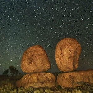 Rock formation at Devils Marbles with star sky - Australia, Northern Territory