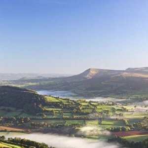 Rolling mist covered farmland in the Usk Valley, Brecon Beacons National Park, Powys